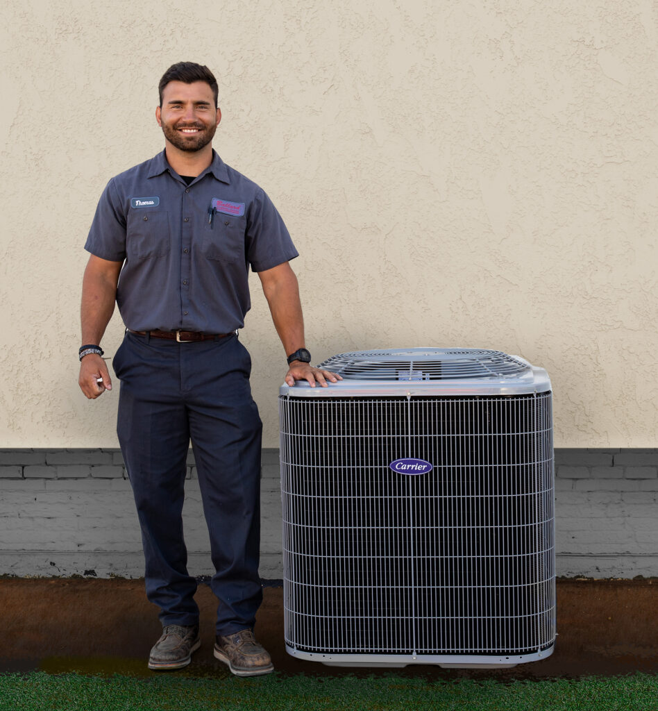 Ballard tech stading next to an HVAC unit